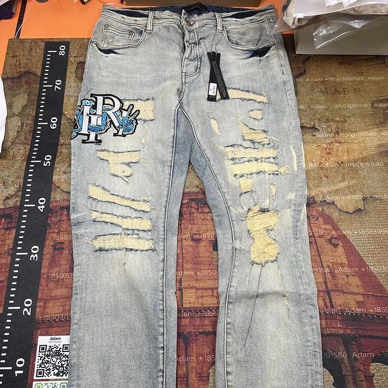 AMIRI Distressed Denim Jeans
