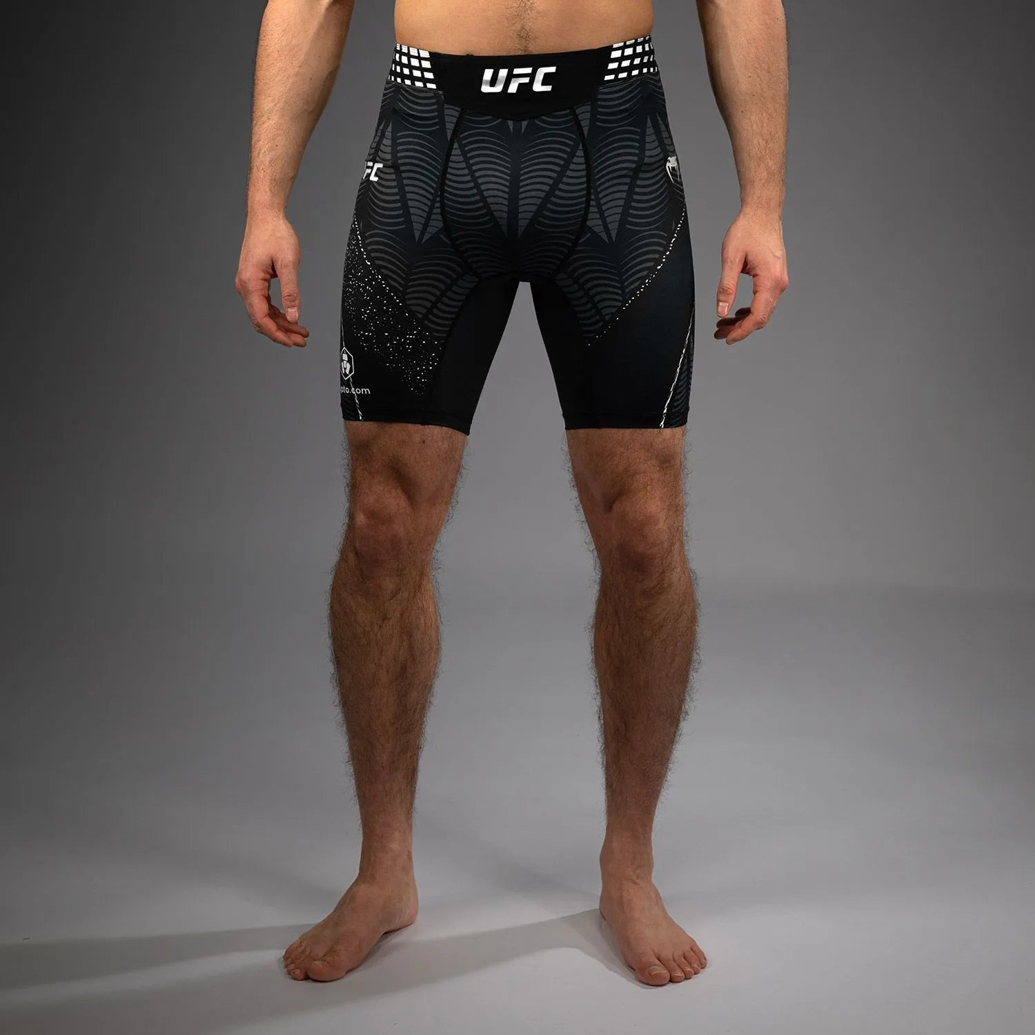 Venum T-Shirts Short-Sleeve UFC Fight Shirt — 11-Black and white tight-fitting shorts