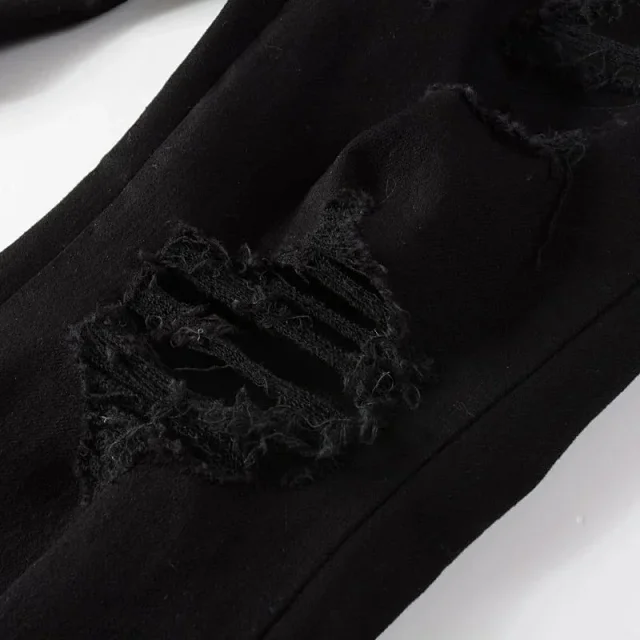 AMIRI Jeans Distressed skinny with logo appliqué product detail image 13