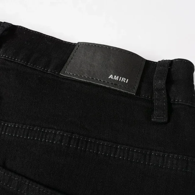 AMIRI Jeans Distressed skinny with logo appliqué product detail image 12