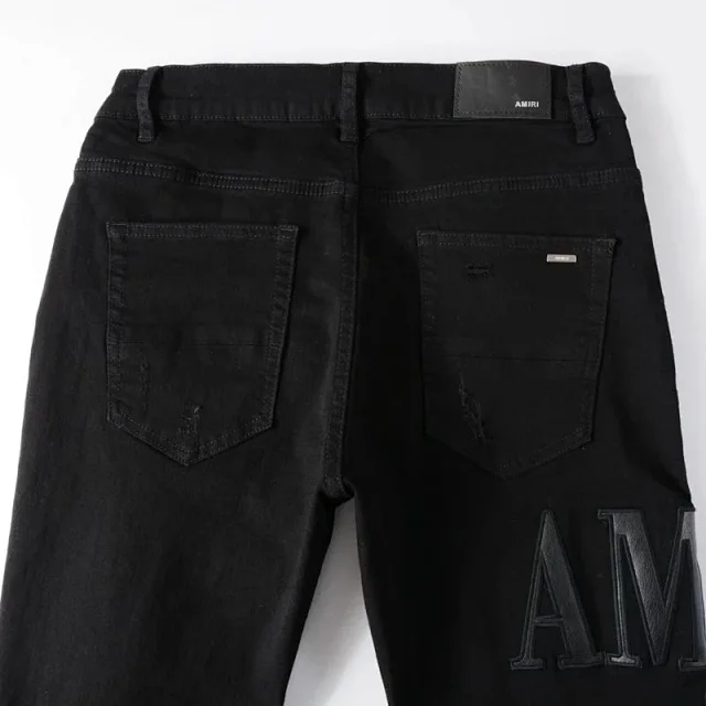 AMIRI Jeans Distressed skinny with logo appliqué product detail image 11