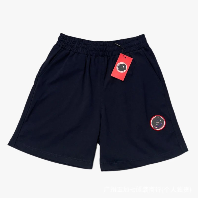 Dark blue pants with a red label