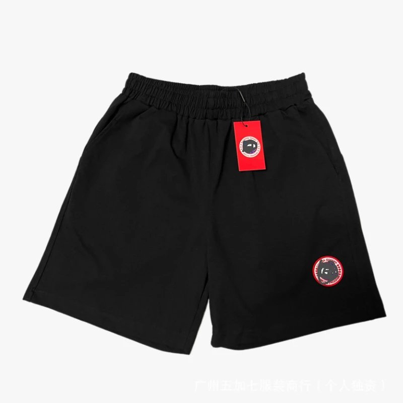 Black pants with a red label