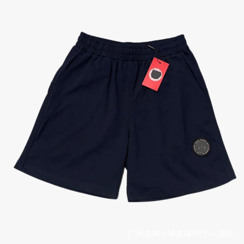 Dark blue pants with a black label