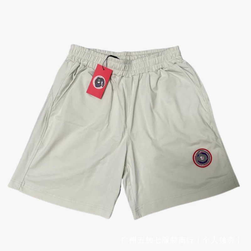 Off-white pants with a red label