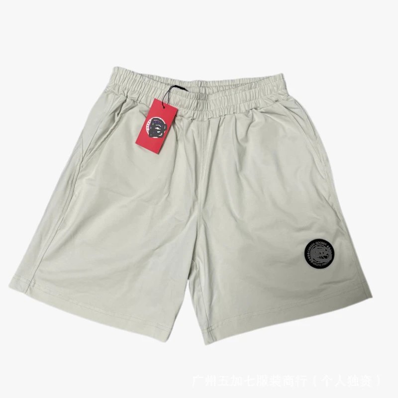 Off-white pants with a black label