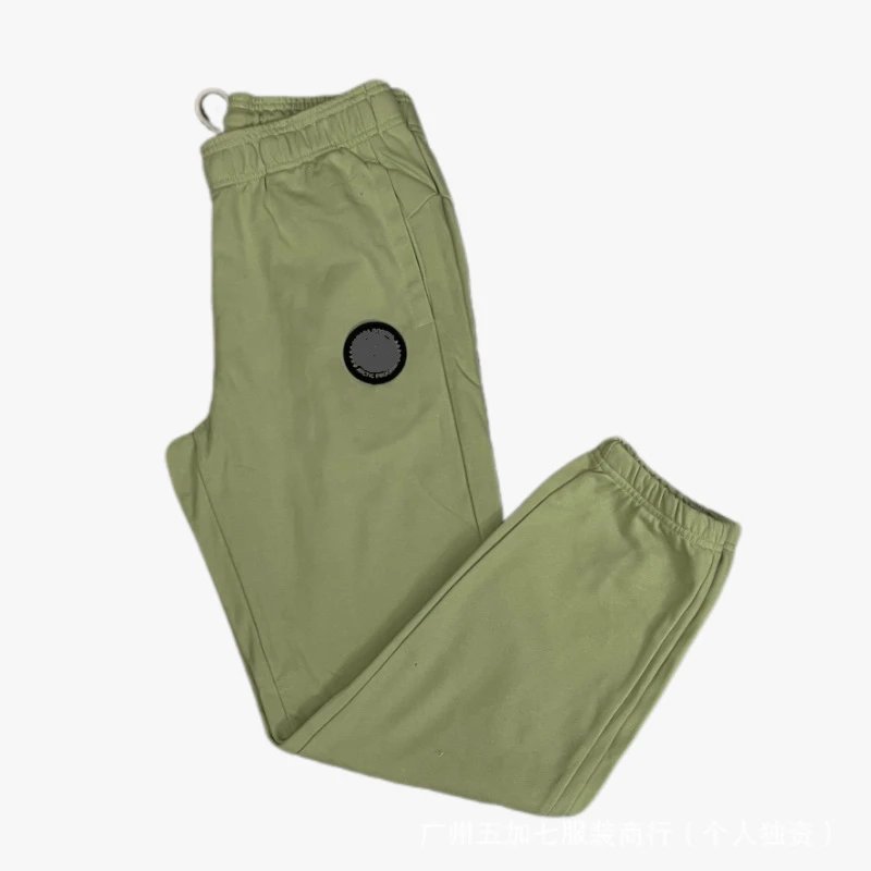 Apple green pants with black label
