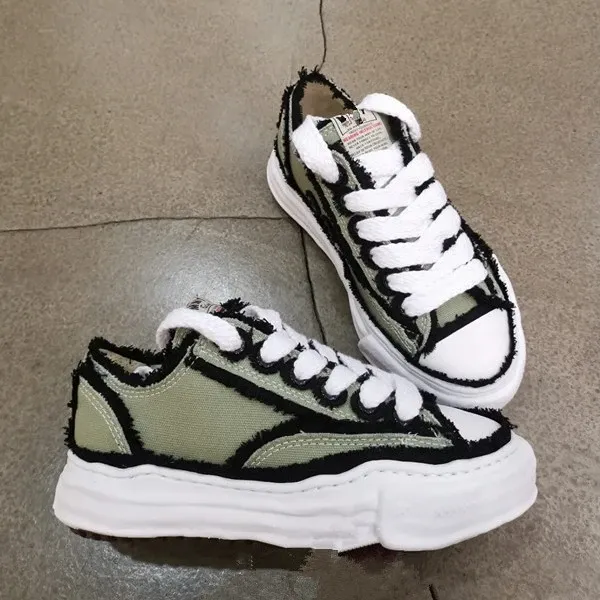 Maison Margiela Tabi Sneaker Olive Green Distressed Canvas Sneakers - 1