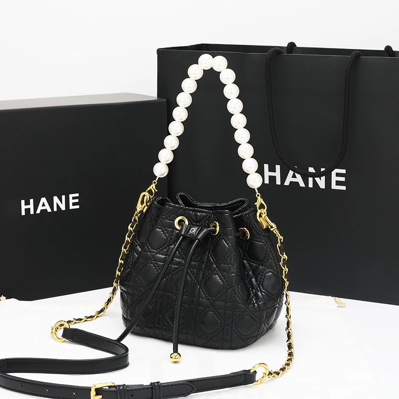 HANE Pearl-Strap Quilted Bucket Bag Black Handbags