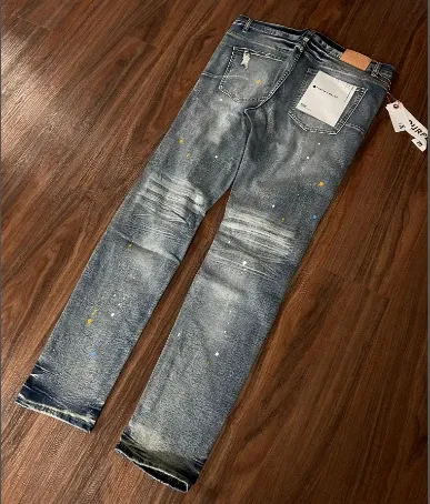 Amiri Paint Splatter Distressed Slim Fit Jeans Blue - 1