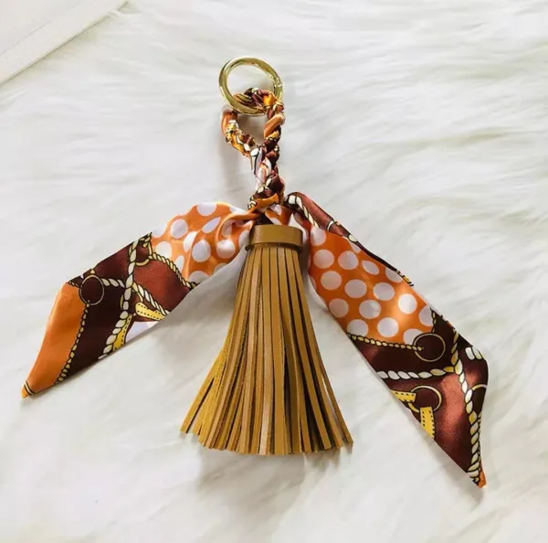 Design Silk Scarf Keychain with Leather Tassel in Orange and Brown Accessories - 1