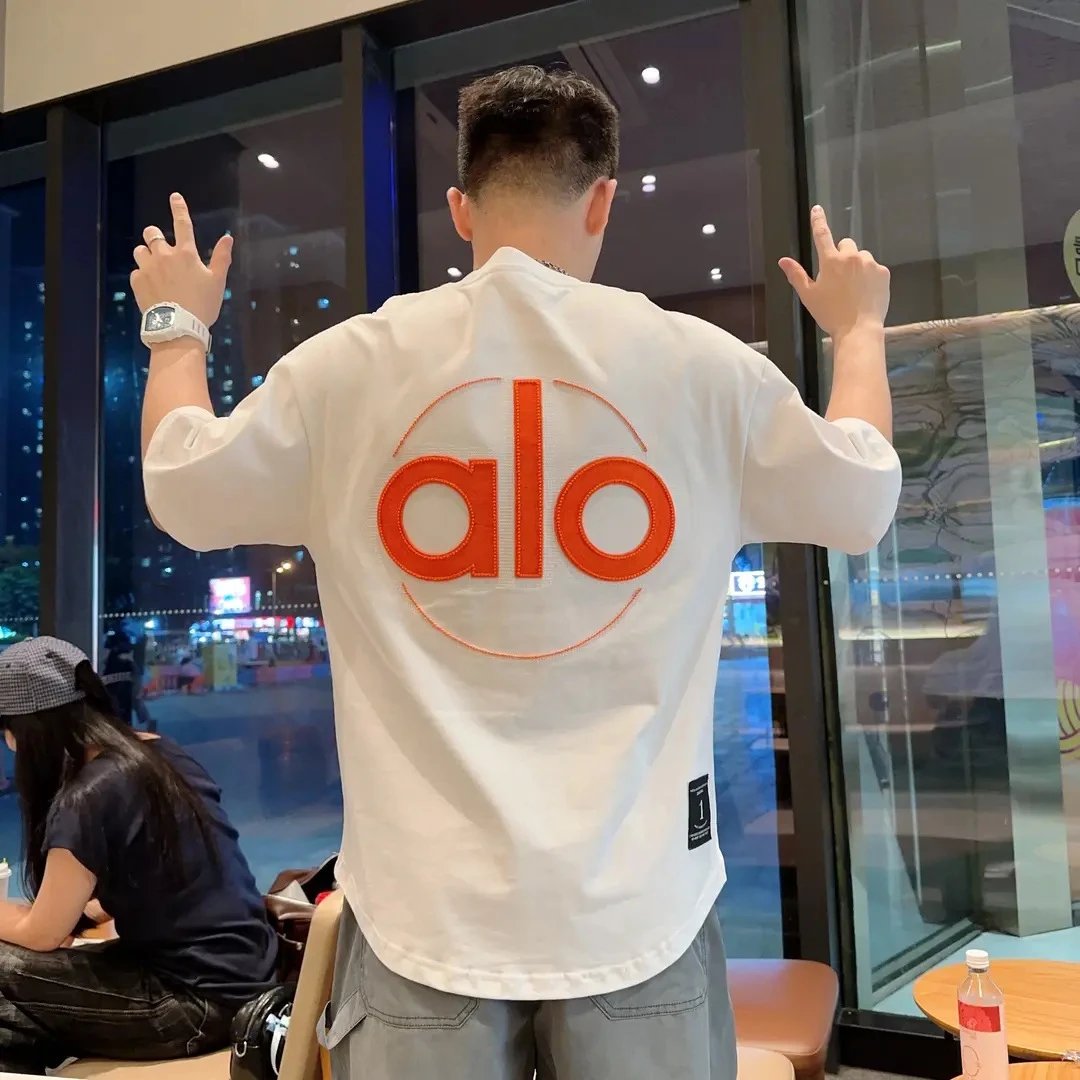 Alo Embossed Letter T-Shirt photo 2