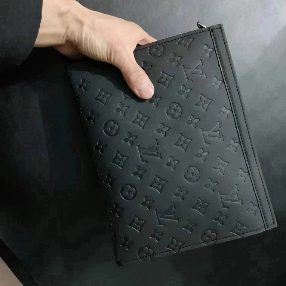 Louis Vuitton Handbags Monogram embossed zip clutch pouch — three-dimensional printing