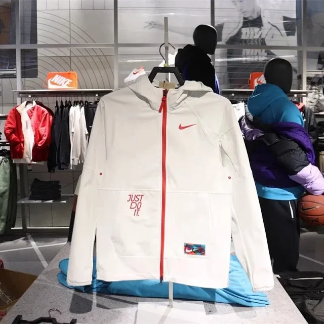 Nike Jackets Full-Zip Hooded Windbreaker Jacket with Just Do It Graphic product detail image 1
