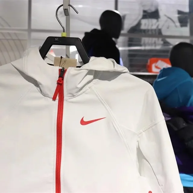Nike Jackets Full-Zip Hooded Windbreaker Jacket with Just Do It Graphic product detail image 8