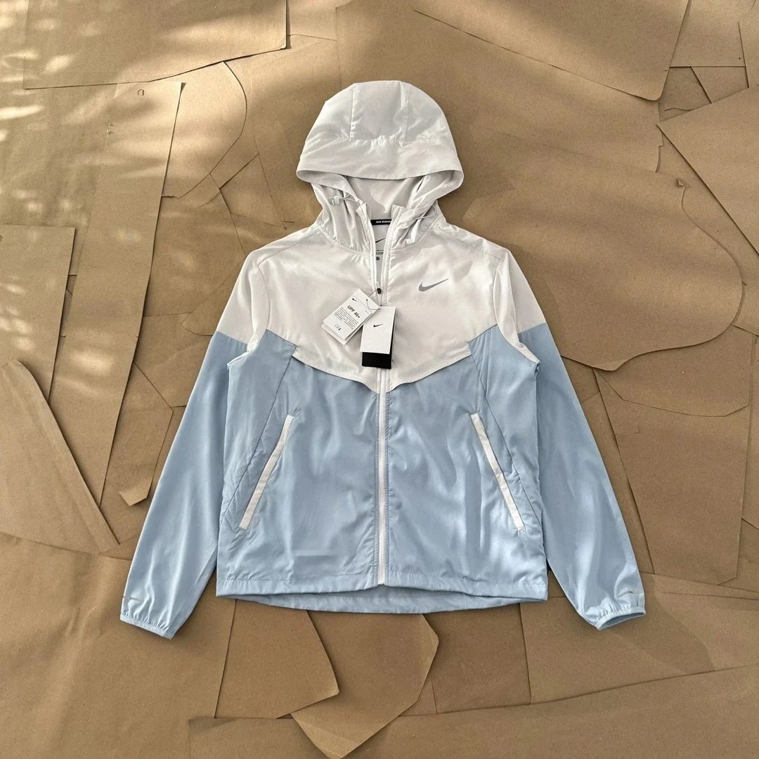 Nike Jackets Hooded lightweight windbreaker — White and blue color-blocked
