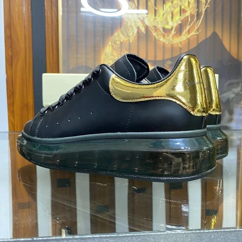 Alexander McQueen Sneakers Leather low-top with transparent air-cushion sole — air cushion black gold tail
