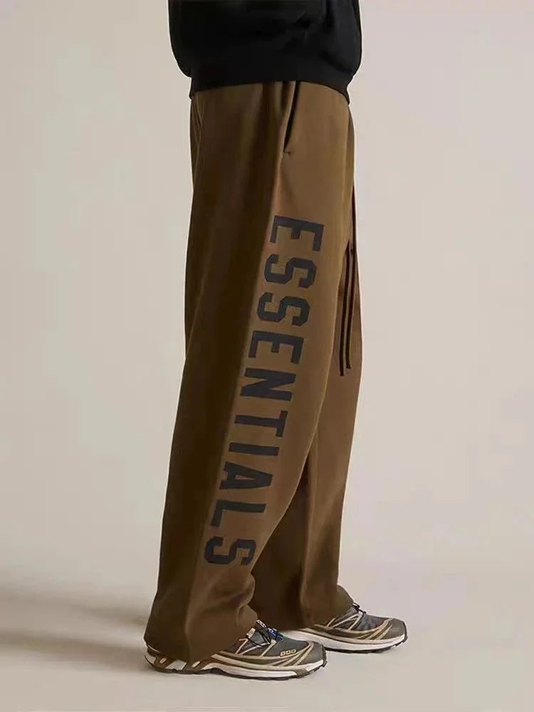Fear of God Essentials Trousers Wide-Leg Drawstring with Vertical Leg Print — Brown