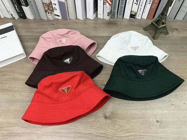 Prada Hats Triangle Plaque Bucket Hat product detail image 1