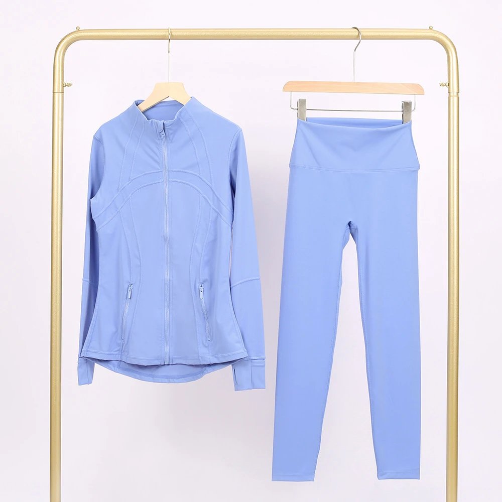 Alo Matching Sets Contrast-Trim Crop Top and Wrap-Style Skirt Set — Smog-blue jacket and cropped pants set