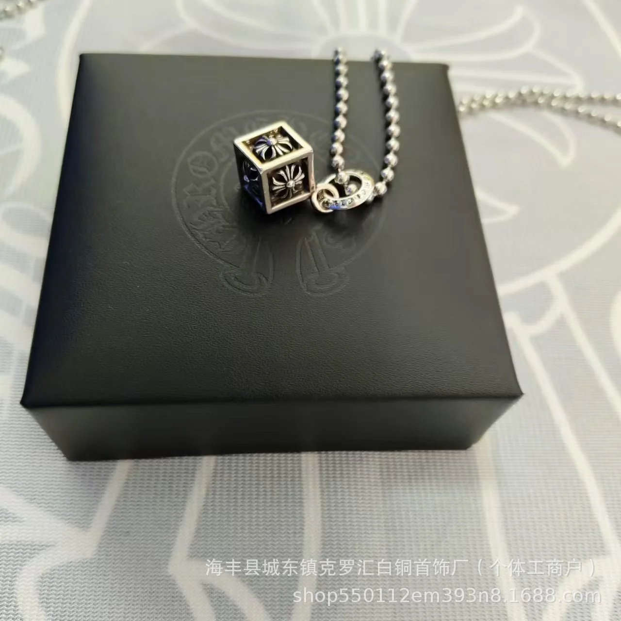 Cross sieve with ball chain SKU image