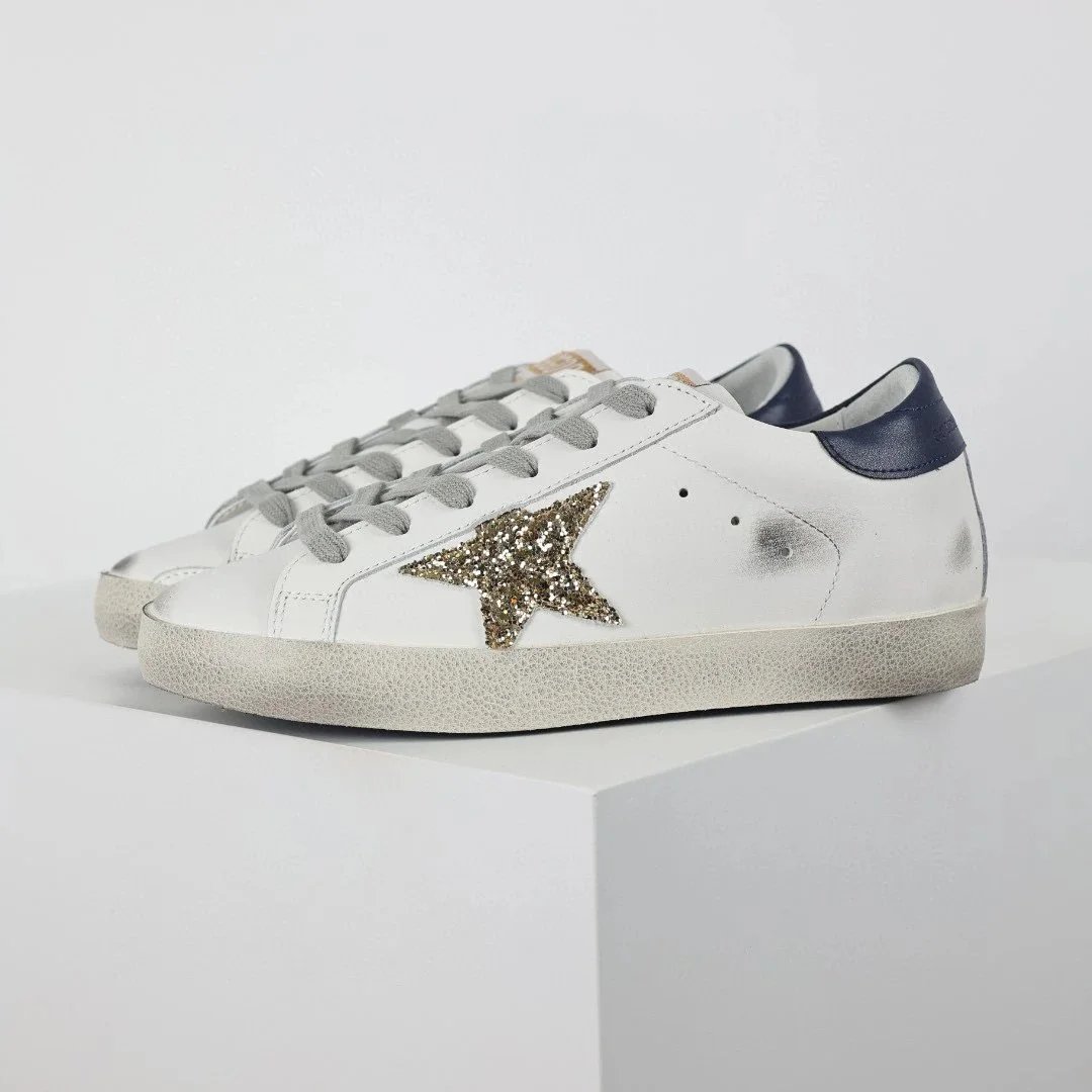 12- Gold glitter star deep blue tail small dirty shoes