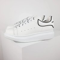 14-MK black and white striped tail (G)