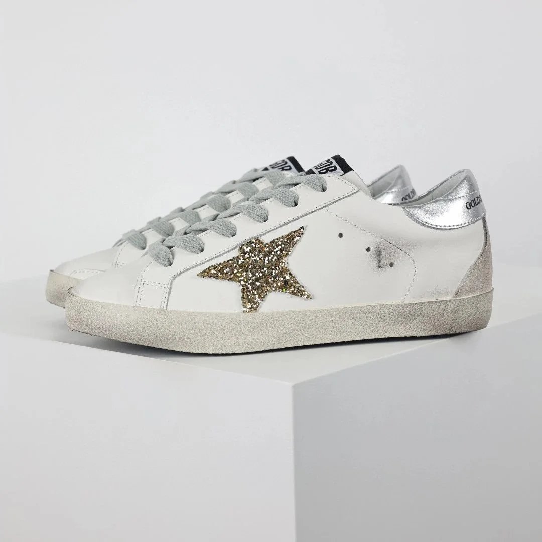 13- Gold glitter star silver tail small dirty shoes