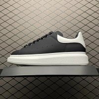 23-MK all-black body with a white tail (G)