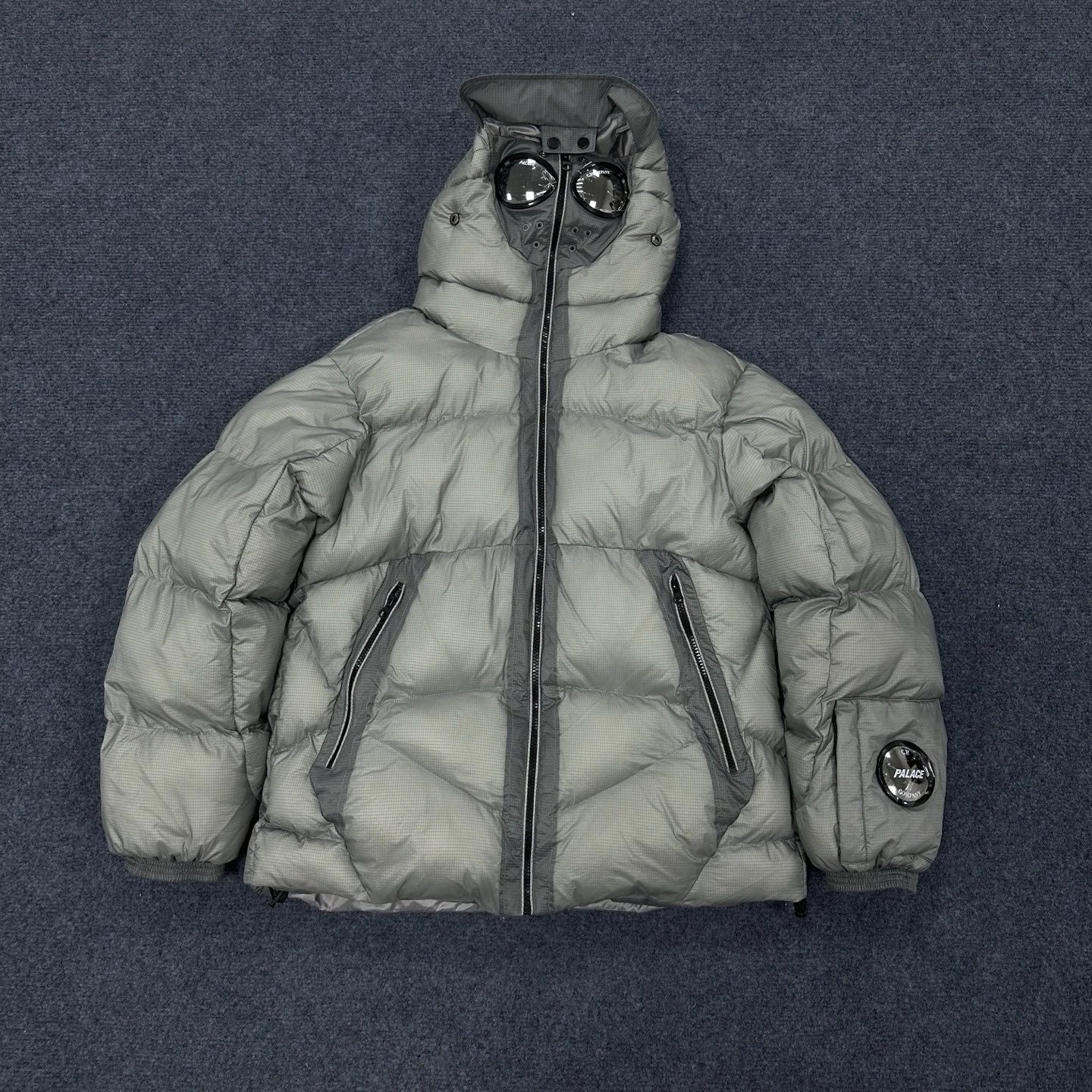 C.P. Company Vests Hooded Goggle Puffer Vest — Cotton-padded jacket in silver (with goggles)