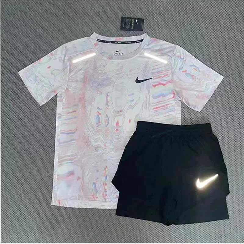 Nike Matching Sets Patterned running top and reflective shorts set image 2
