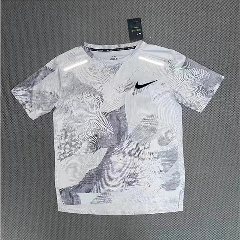 Nike Matching Sets Patterned running top and reflective shorts set — White and gray short-sleeved shirt
