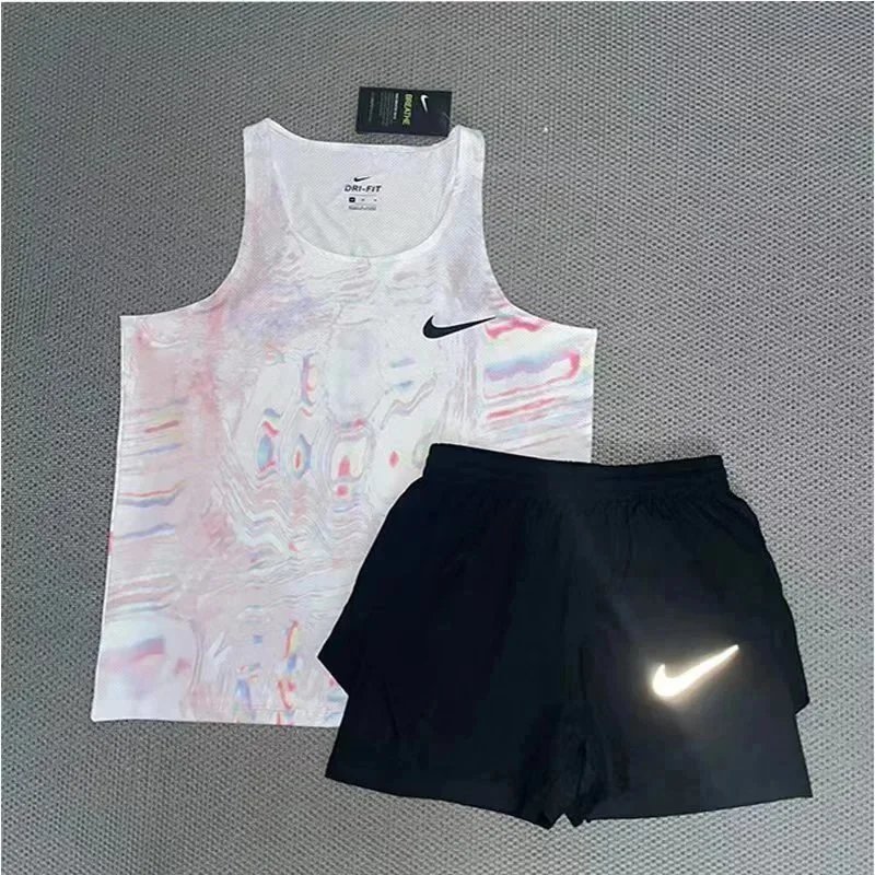 Nike Matching Sets Patterned running top and reflective shorts set — White powder-colored tank top and three-quarter-length shorts set