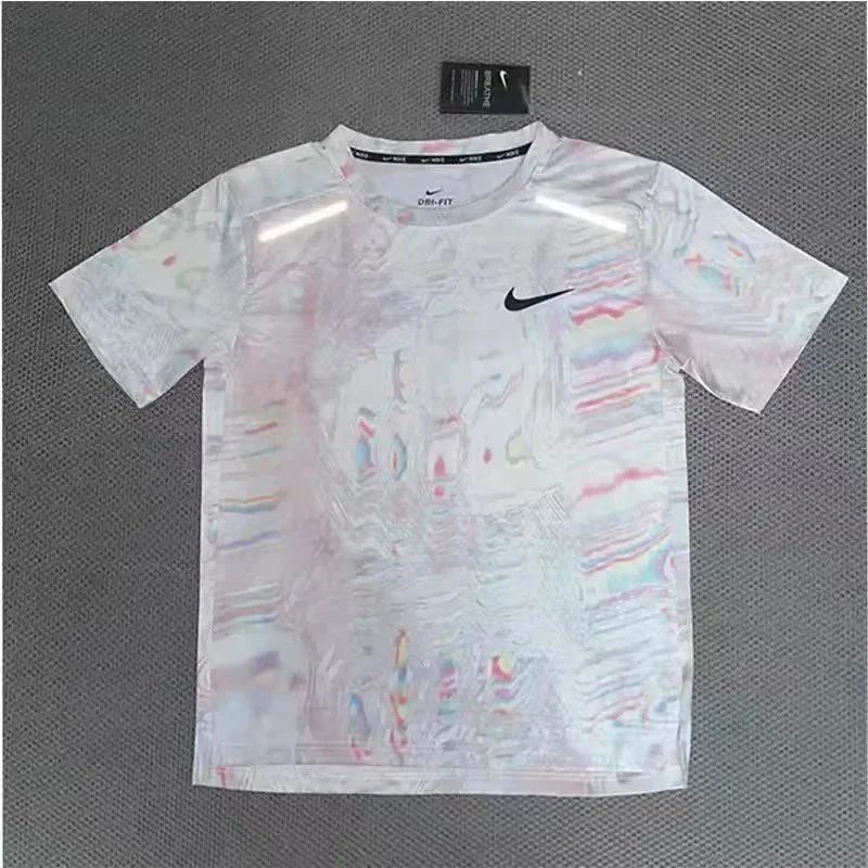 Nike Matching Sets Patterned running top and reflective shorts set — White powder short sleeve