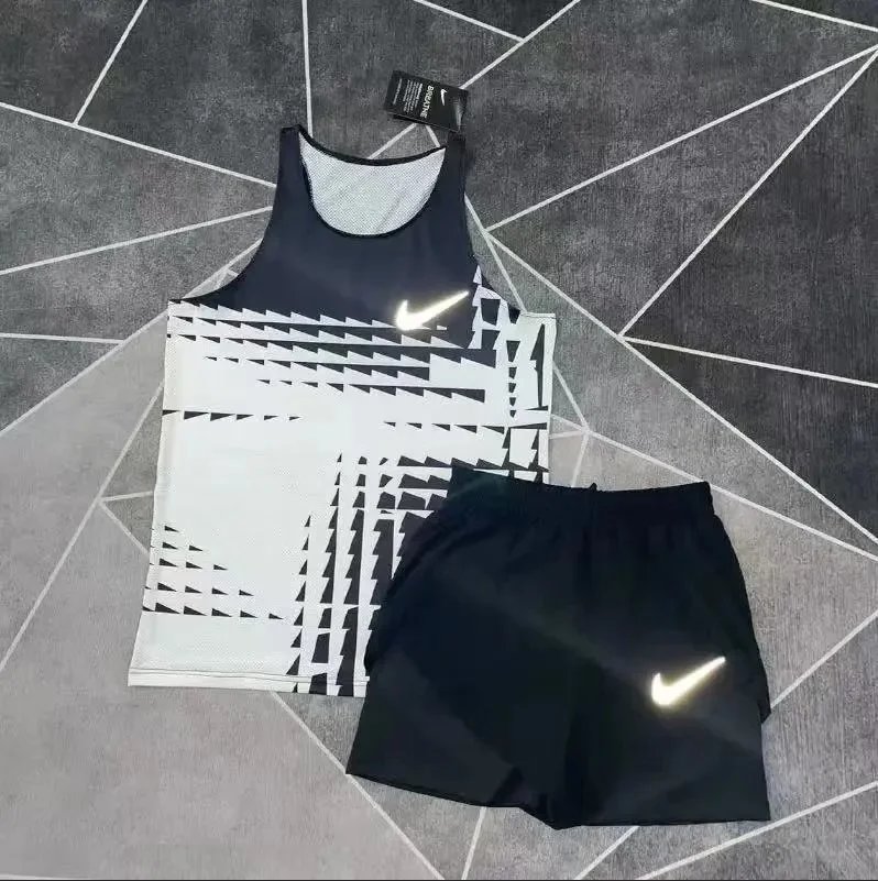 Nike Matching Sets Patterned running top and reflective shorts set — DA black tank top and 3/4-length shorts set
