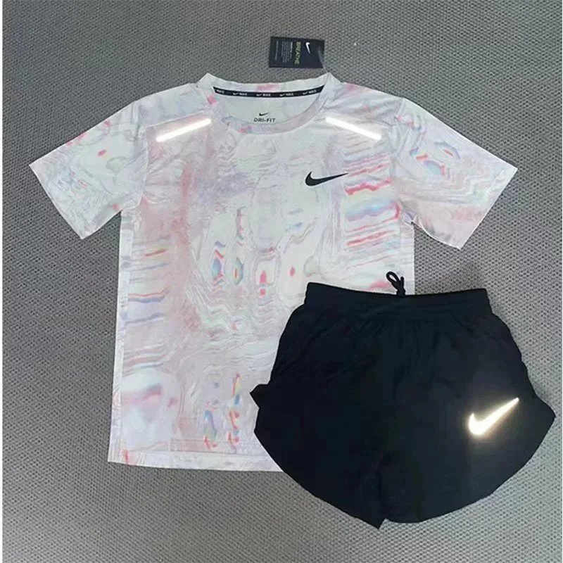Nike Matching Sets Patterned running top and reflective shorts set — White powder short-sleeve and three-quarter-length shorts set