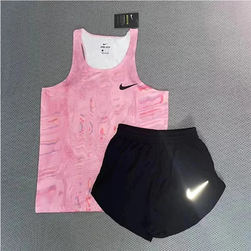 Nike Matching Sets Patterned running top and reflective shorts set — Pink tank top and 3-inch shorts set