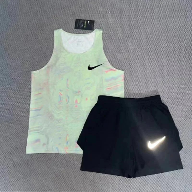 Nike Matching Sets Patterned running top and reflective shorts set — Light green vest and a pair of three-quarter-length rural-style shorts, one set