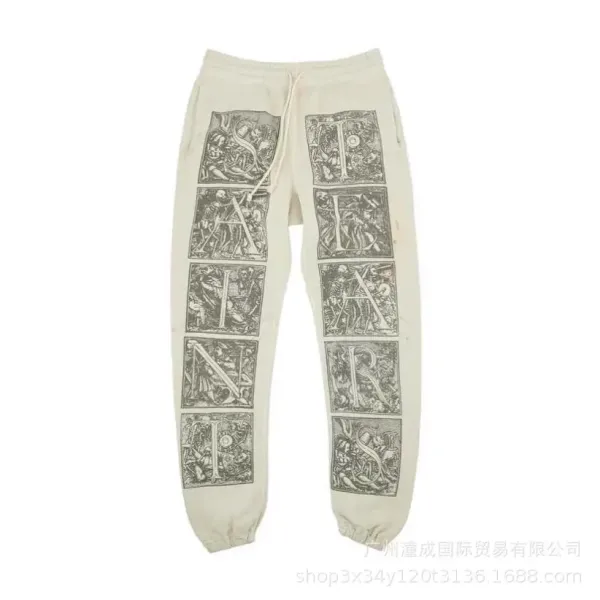 Saint Laurent Vintage-Inspired Letterpress Print Sweatpants Beige - 1