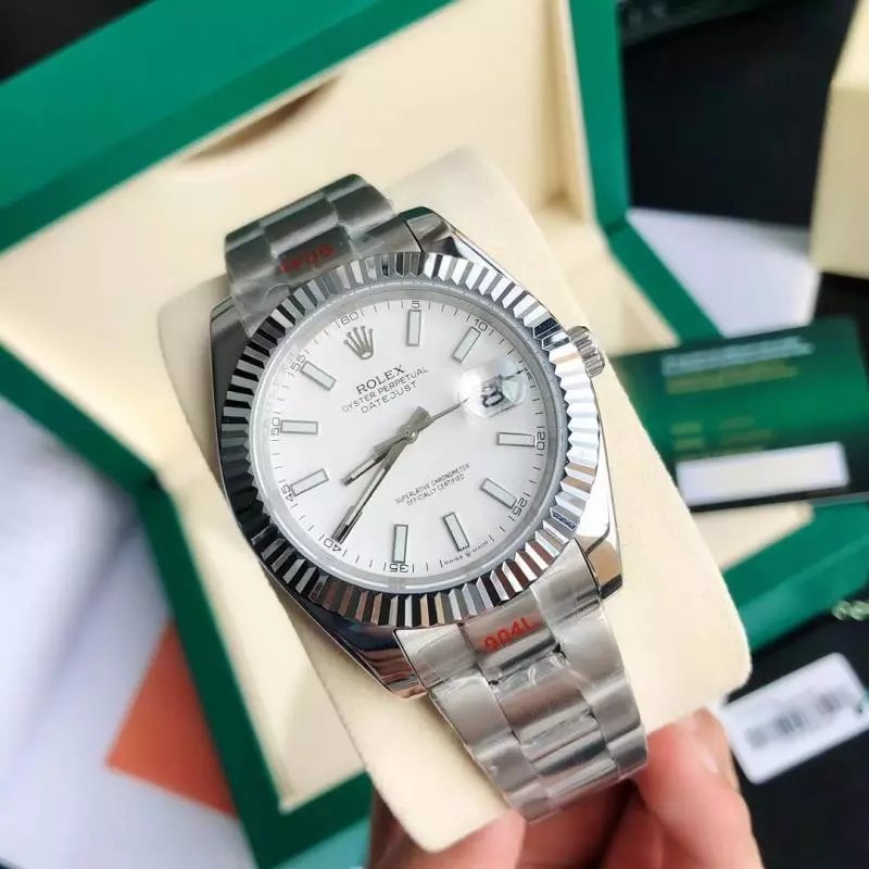 Rolex Watches Datejust fluted-bezel bracelet watch — Silver case with white dial, three-link bracelet, and mineral‐strengthened glass.