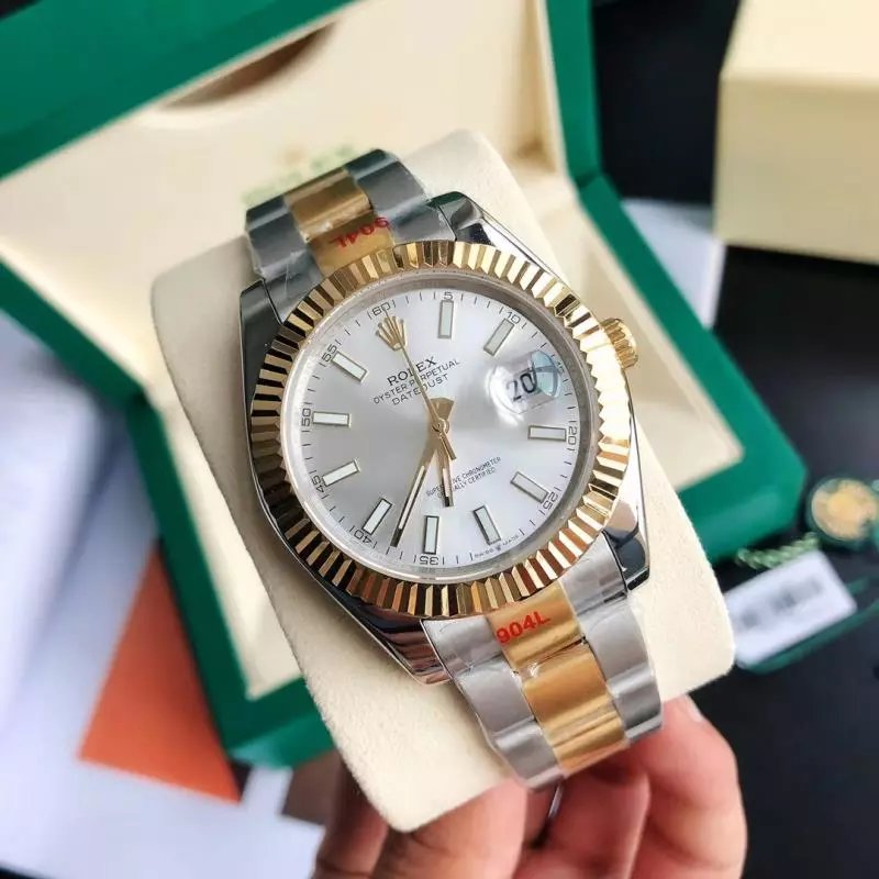 Rolex Watches Datejust fluted-bezel bracelet watch — Golden and silver dial with a three-link strap, mineral‐strengthened glass.