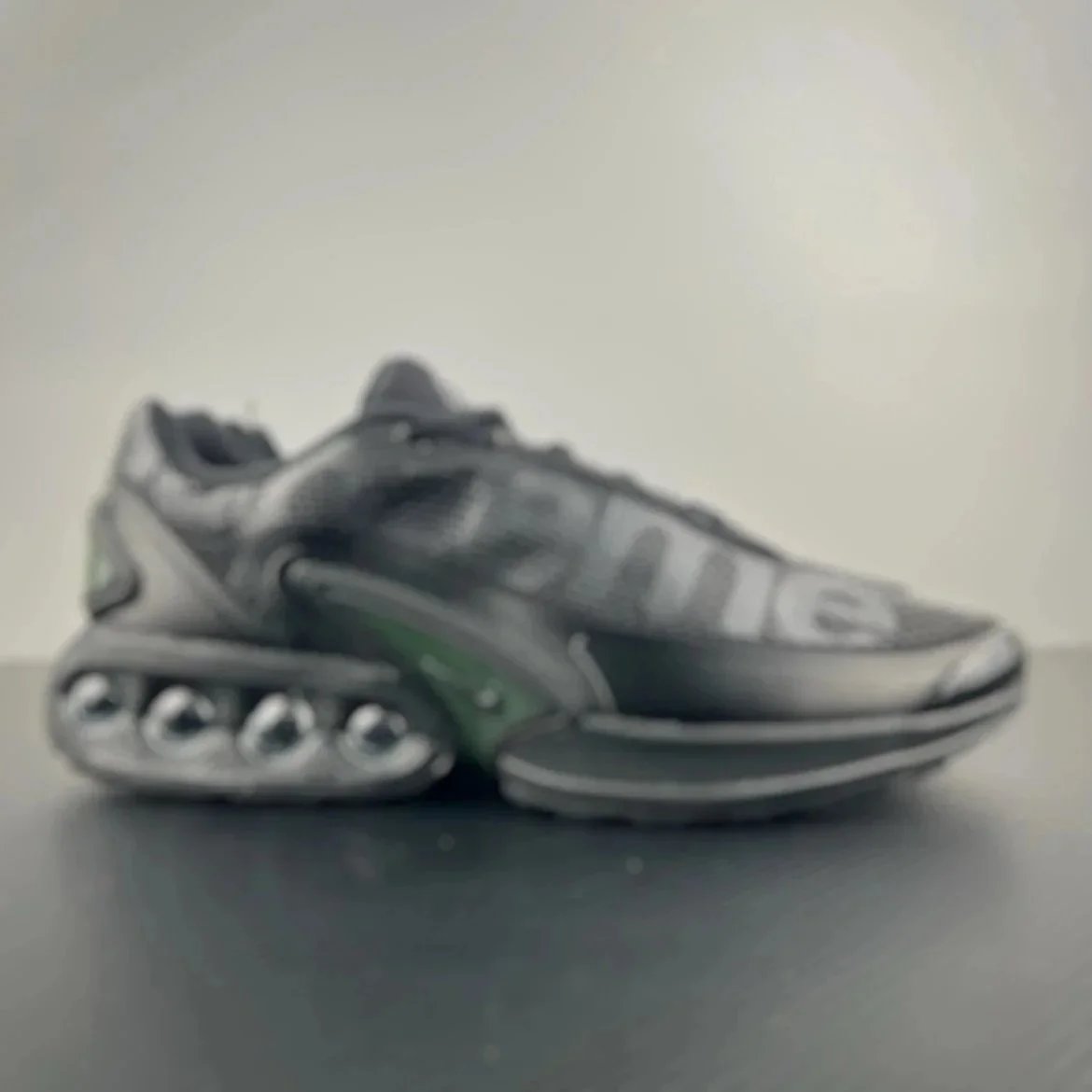 Grey and Green Sneaker with Unique Sole Design