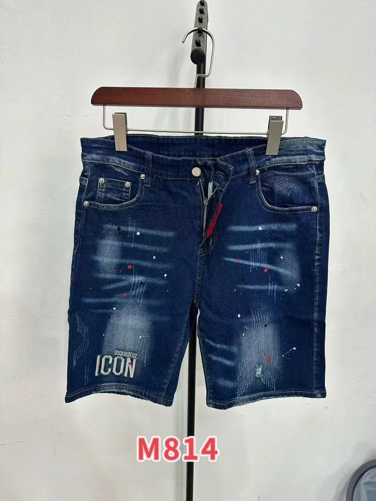Dsquared2 Black distressed paint splatter hole jeans with maple leaf ICON personalized design - European and American style men's jeans