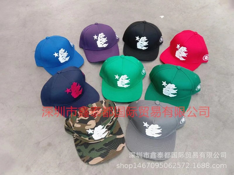Hellstar Hats Embroidered star and flame graphic baseball cap — H optional