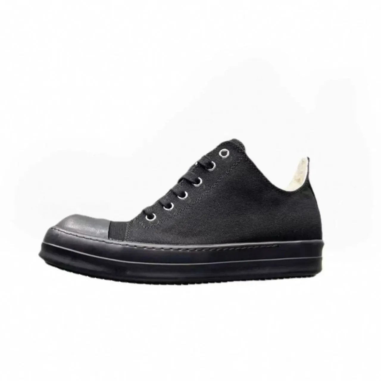 Low-top solid black canvas