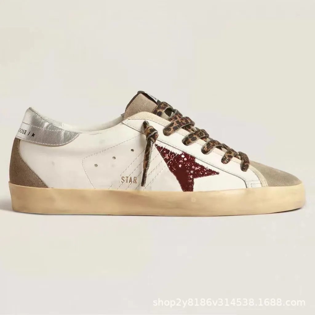 Silver heel with red check star