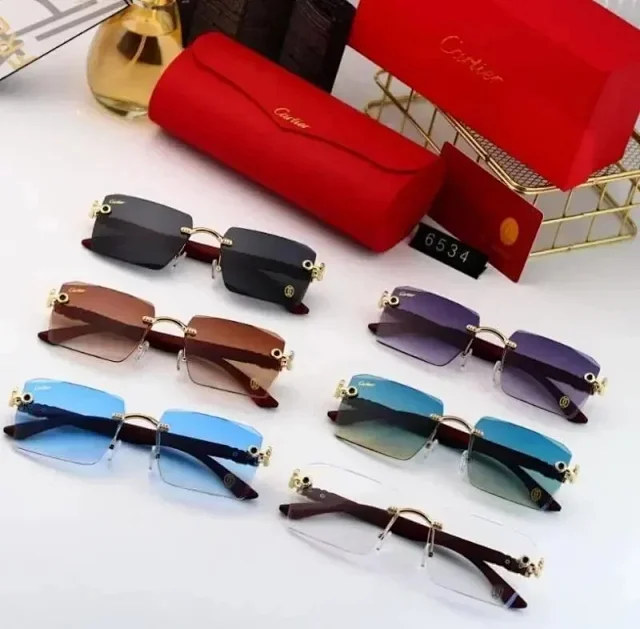 Cartier Eyewear Rimless Rectangular Sunglasses with Gold Cross Decorations product detail image 2