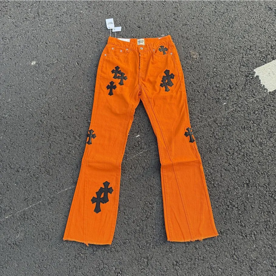 Chrome Hearts black leather cross patch orange flare jeans