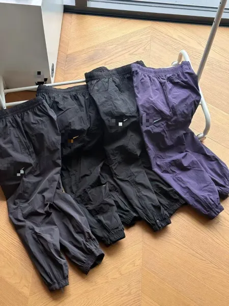 Alo Yoga Windbreaker Pants Charcoal Gray Pants - 4