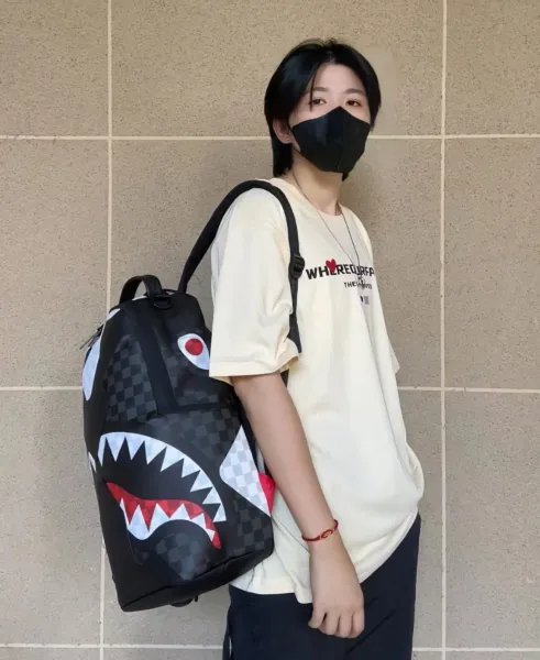 A Bathing Ape Sprayground Shark Backpack Black Checkerboard Multicolor Backpack Backpacks - 1